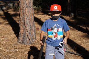 A learner in an outdoor learning space as a part of Sierra Nevada Journeys' 2020 pandemic pilot.