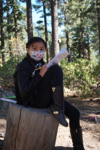 A learner in an outdoor learning space as a part of Sierra Nevada Journeys' 2020 pandemic pilot.